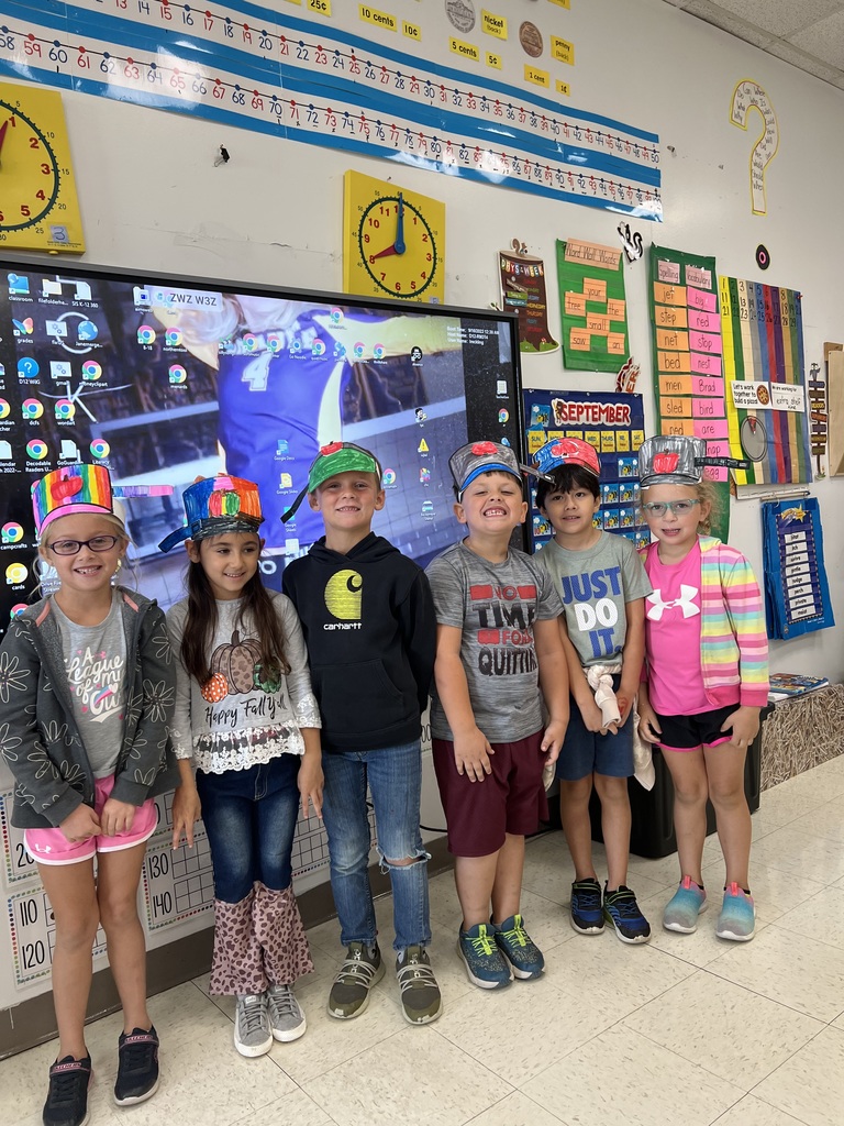 First graders celebrated Johnny Appleseed Day by making hats, eating caramel apples, and watching the movie of his life.